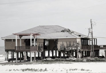 wind damage - spray foam can help prevent uplift to reno roofs